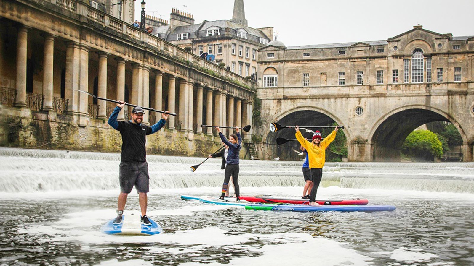 People paddleboarding in Bath with Original Wild